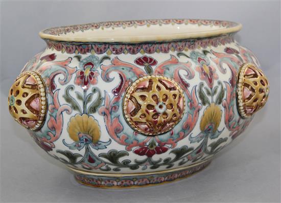 A Zsolnay Pecs pottery Persian inspired oval jardiniere, late 19th century, 29cm, slight restorations